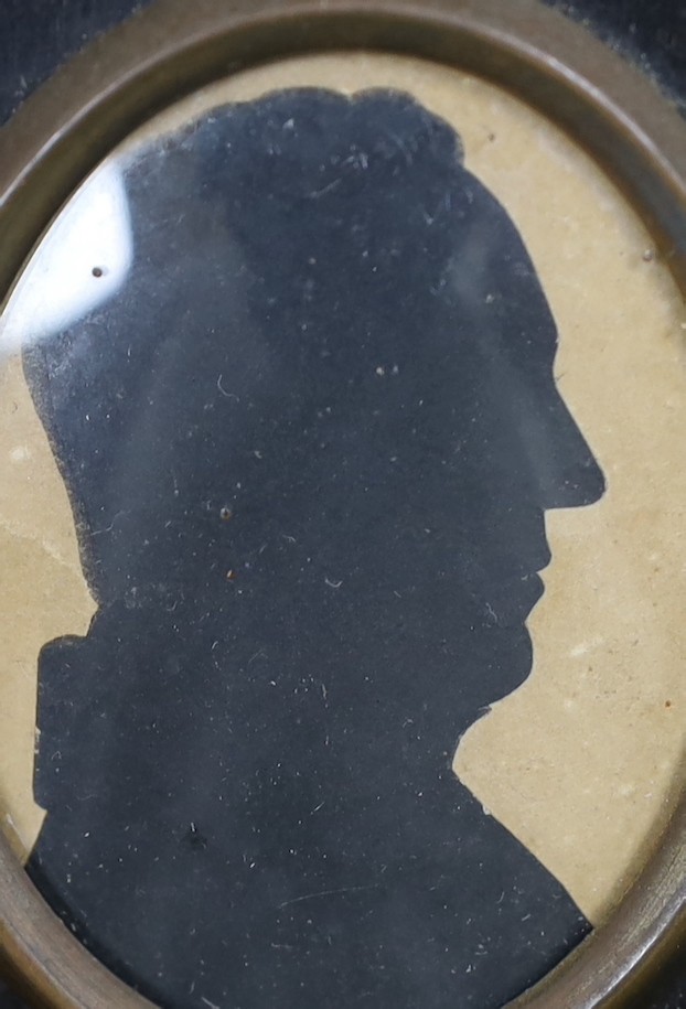Four Victorian painted and cut paper silhouettes of Colonel John Campbell and other members of his family